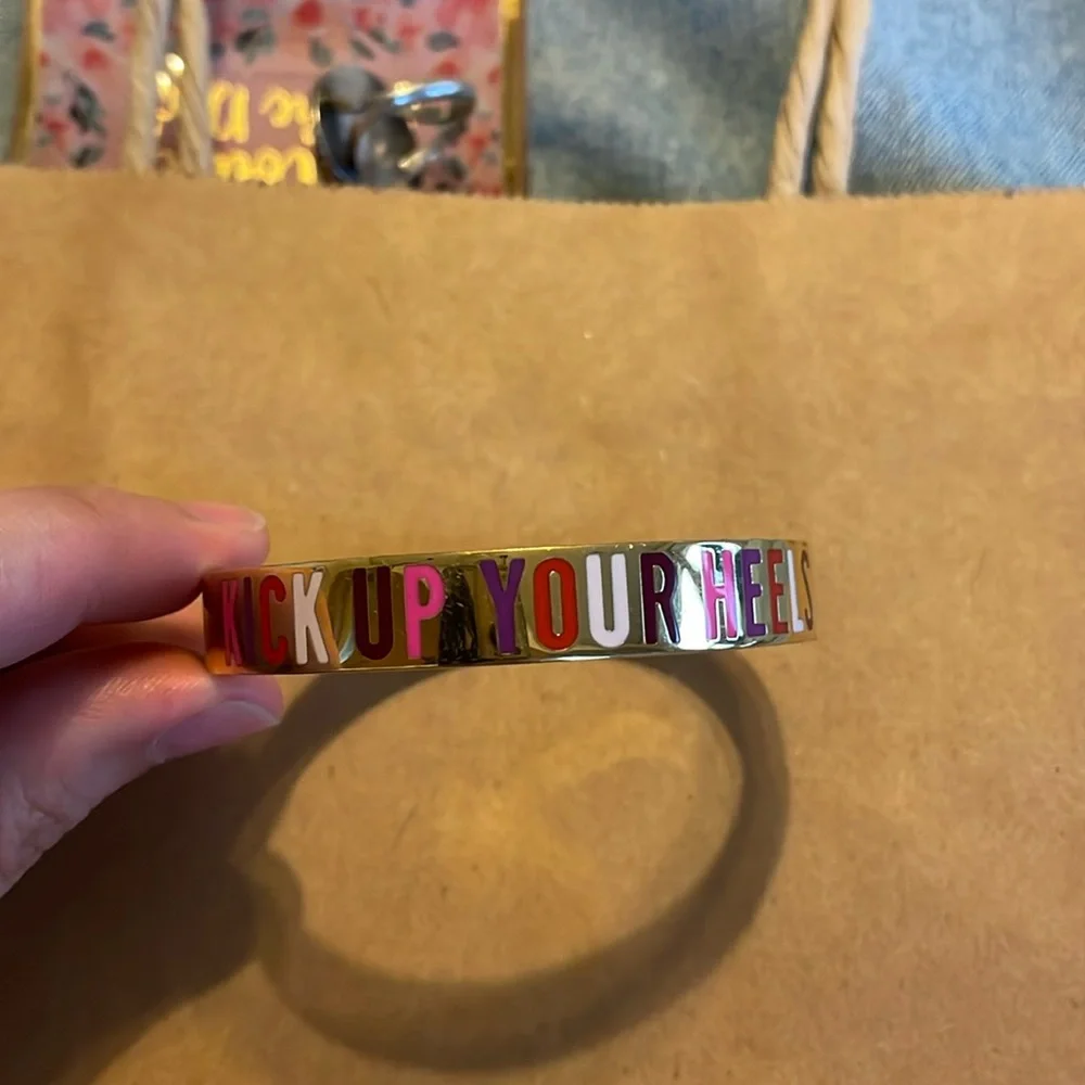 Gold-plated Kate Spade bangle